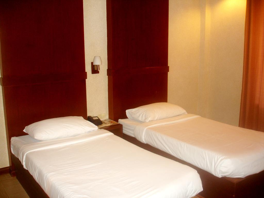 Roxas Midtown Hotel Roxas City Quarto foto