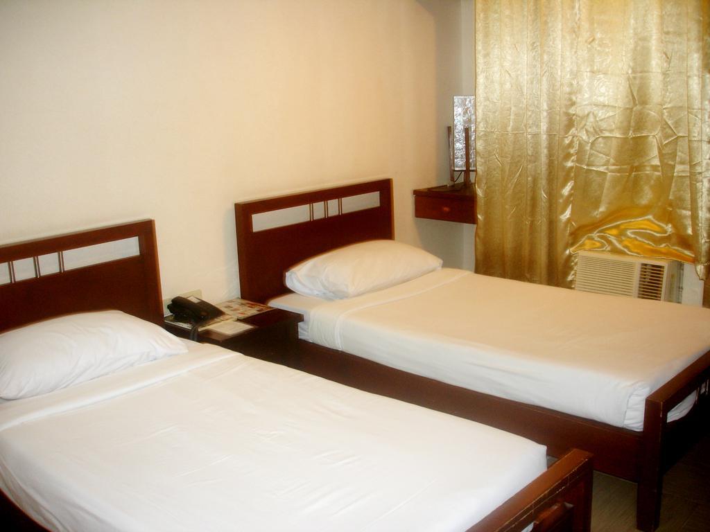 Roxas Midtown Hotel Roxas City Quarto foto