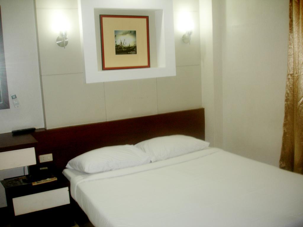 Roxas Midtown Hotel Roxas City Quarto foto