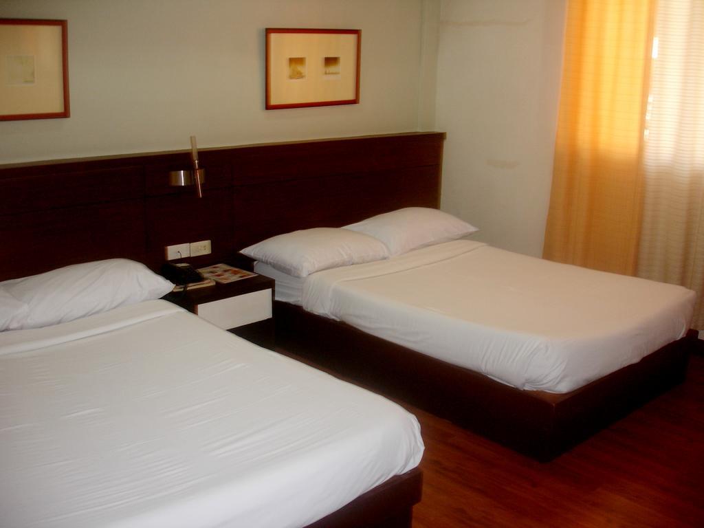 Roxas Midtown Hotel Roxas City Quarto foto