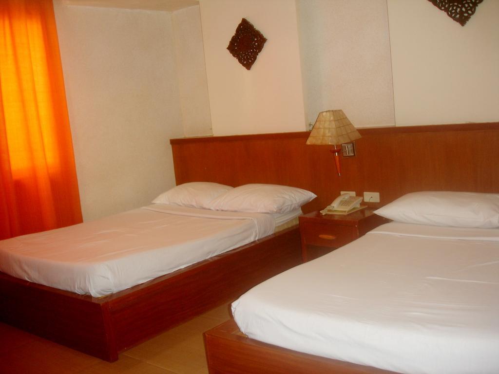 Roxas Midtown Hotel Roxas City Quarto foto