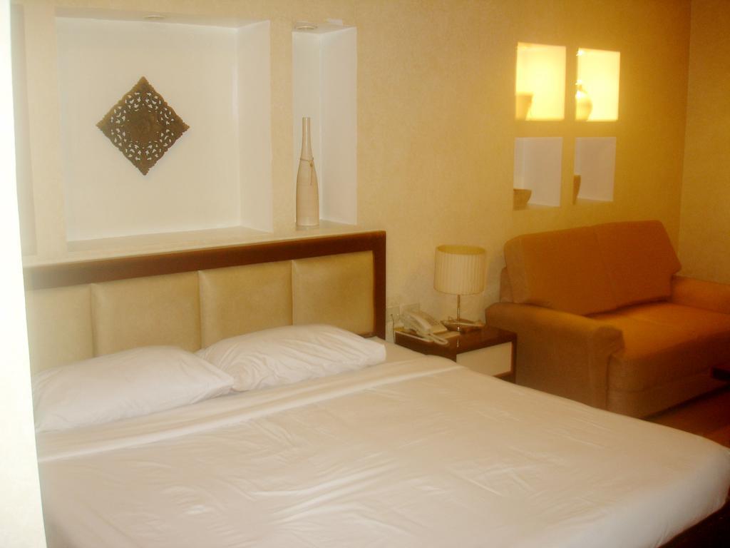 Roxas Midtown Hotel Roxas City Quarto foto